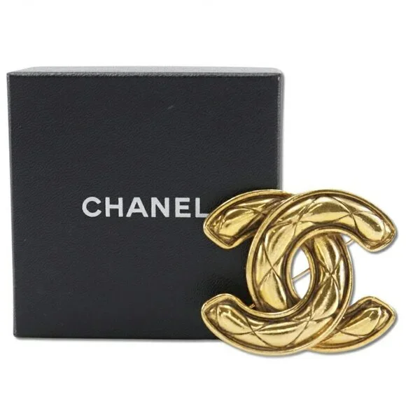 CHANEL Gold Logo Brooch